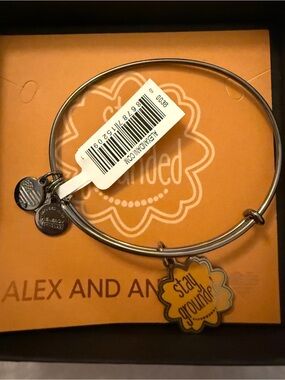 Alex and Ani Silver Bangle with Yellow 'Stay Grounded' Flower Charm
